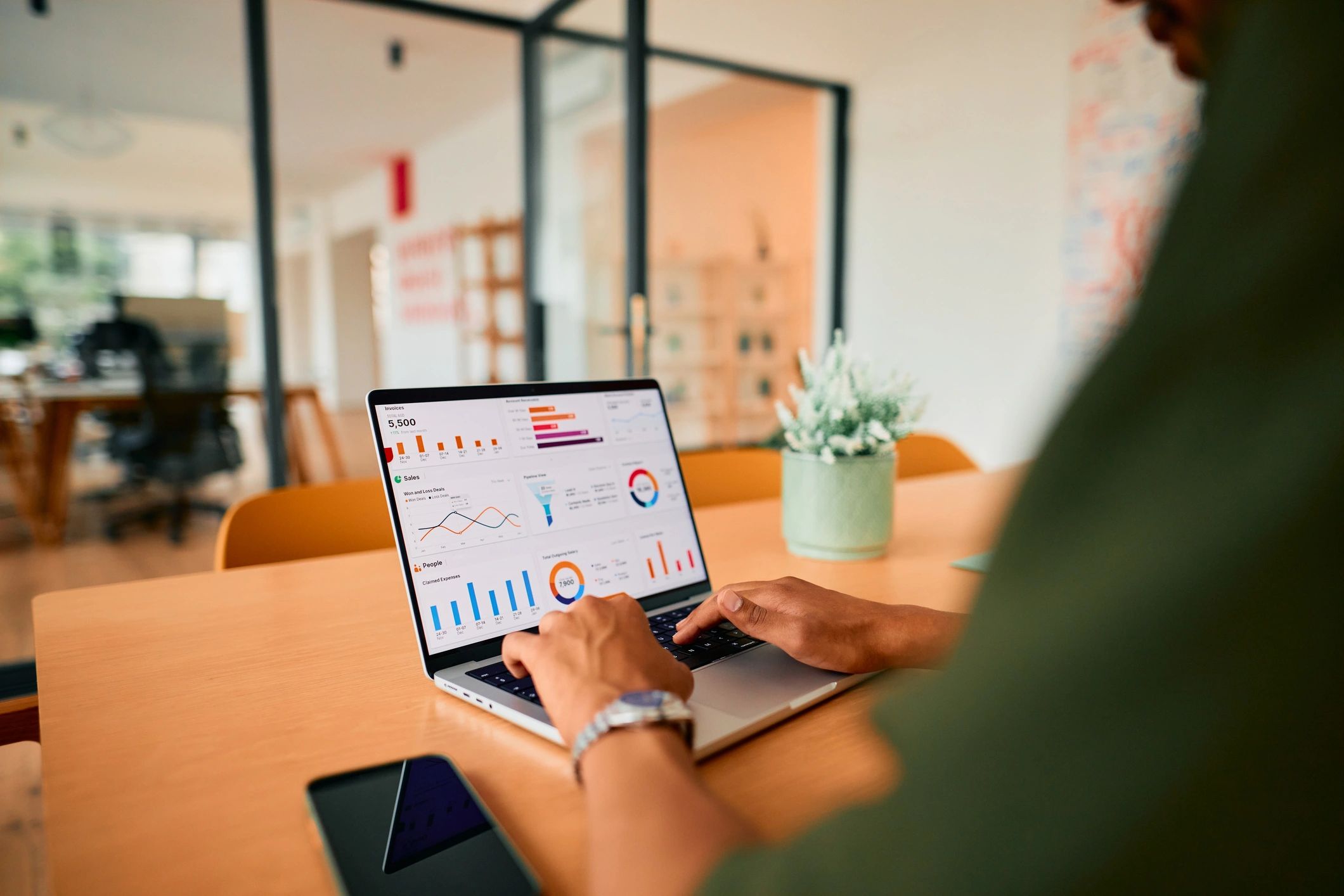 Funderbund team collaborating in a modern office